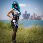 Detroit BDSM Mistress in blue wig and skeleton top