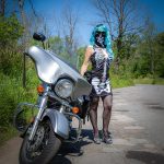 Domme Detroit Michigan blue wig next to motorcycle