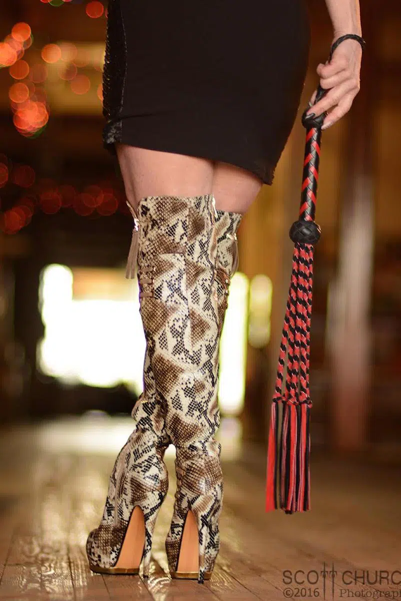 Snakeskin Boots Whipping with red and black flogger