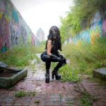 Domina FMTY Detroit Domme black latex squat pose